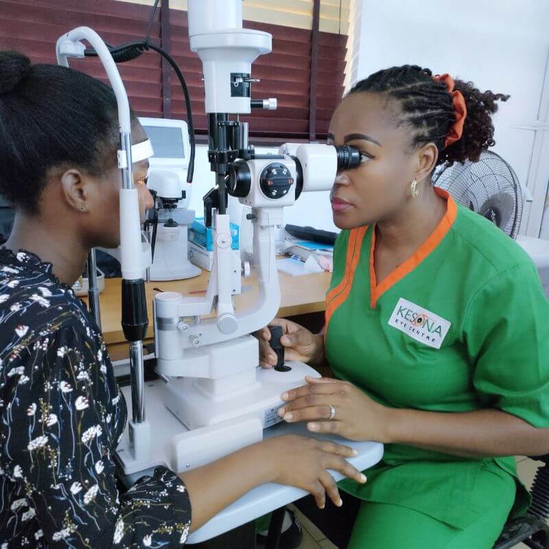 Dr Rose Azuike performing slit lamp exam